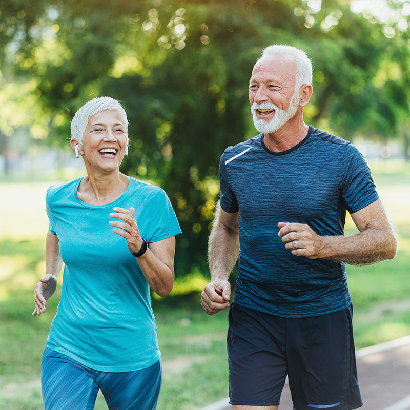 Elderly Couple Running